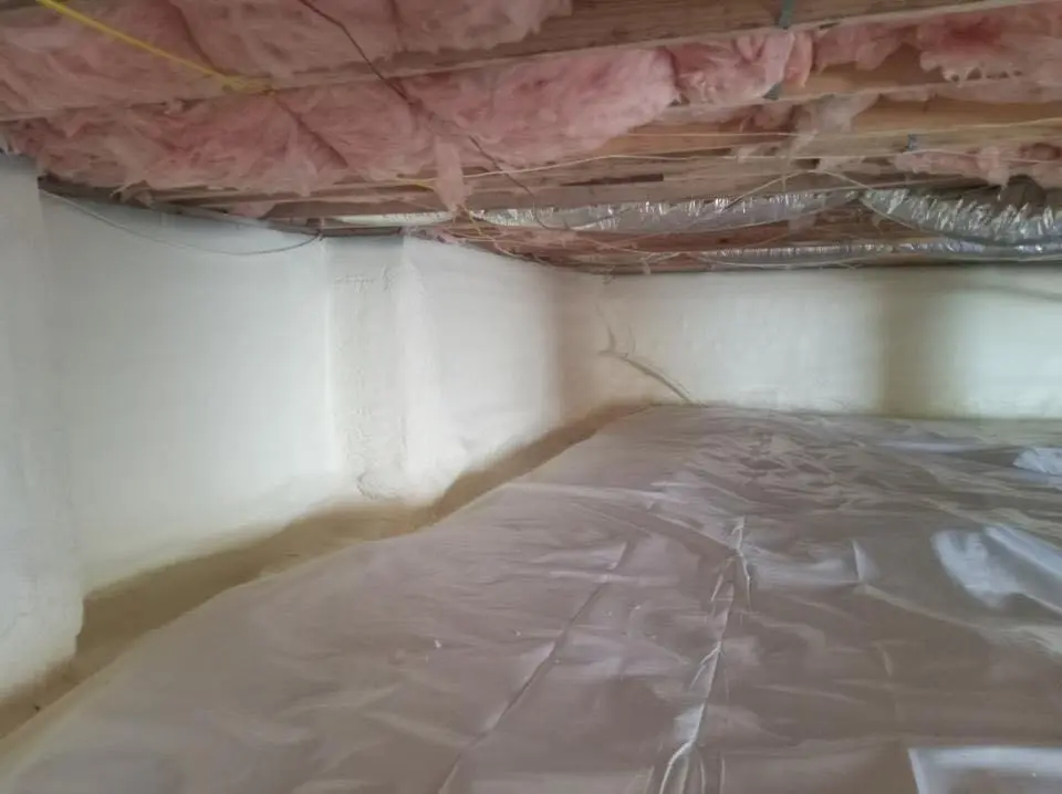 Crawl space encapsulation with closed-cell spray foam for Roof Waterproofing in Milford